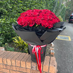 big red rose bouquet with 100 stem roses. perfect for proposals, weddings, anniversaries and birthdays.