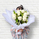Beautiful Single Variety Flower bouquets with white columbian roses and greenery.  Free flower delivery Sydney. Sydney Florist. Bouqie Flower subscription. 