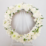 Seasonal white flowers round wreath