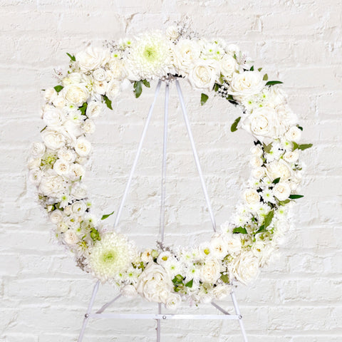 Seasonal white flowers round wreath