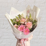pink blush bouquet with roses and gerberas