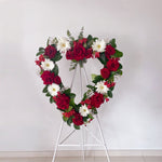 red and white flowers heart wreath