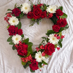 red and white flowers heart wreath