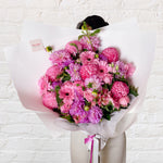 large bouquet featuring seasonal flowers.