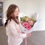 pink blush bouquet with roses and gerberas