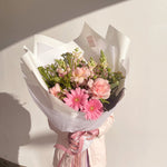 pink blush bouquet with roses and gerberas