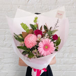 small bouquet featuring soft tones of flowers