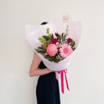 Pretty Pink bouquet with gerberas, carnations, chrysanthemum mums, magnolias, forest fern, molucca balm