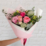 small bouquet featuring soft tones of flowers