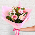 small bouquet featuring soft tones of flowers