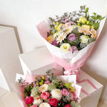 soft and pretty bouquet featuring soft pastel seasonal flowers