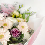 soft and pretty bouquet featuring soft pastel seasonal flowers