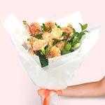 sunset orange bouquet featuring seasonal flowers - roses, dahlias, greenery