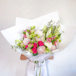 soft tone bouquet featuring lilies, roses, chrysanthemum, alstromeria, greenery.