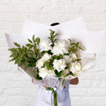 white roses and greenery bouquet