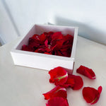 red rose petals in presentational box