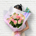 Beautiful Single Variety Flower bouquets with pink columbian roses and greenery.  Free flower delivery Sydney. Sydney Florist. Bouqie Flower subscription. 
