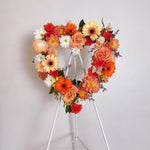 Orange flowers heart wreath