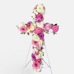 Soft Pink & Lilac cross wreath with white stand