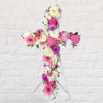 Soft Pink & Lilac cross wreath with white stand