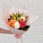 A bouquet filled with bright and vibrant flowers worth $60.