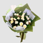 white roses and greenery bouquet 