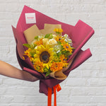 yummy yellow bouquet featuring seasonal flowers 