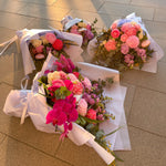 Beautiful seasonal bouquet with chrysanthemums, columbian roses, eucalyptus, delphinium, lisianthus and carnations. Free flower delivery Sydney. Sydney Florist. Bouqie Flower subscription. 