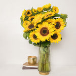 A glass vase of sunflowers. Free flower delivery Sydney. Sydney Florist.